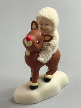 Department 56 Snowbabies Figurine Riding Brown Reindeer with Red Nose